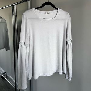 White long sleeve tee with bell sleeves